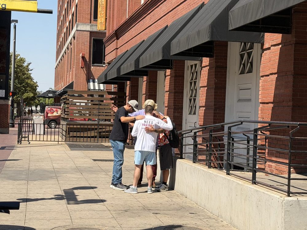 EFL brothers praying with brothers downtown
